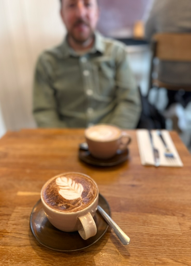 A coffee on a table during a work meeting